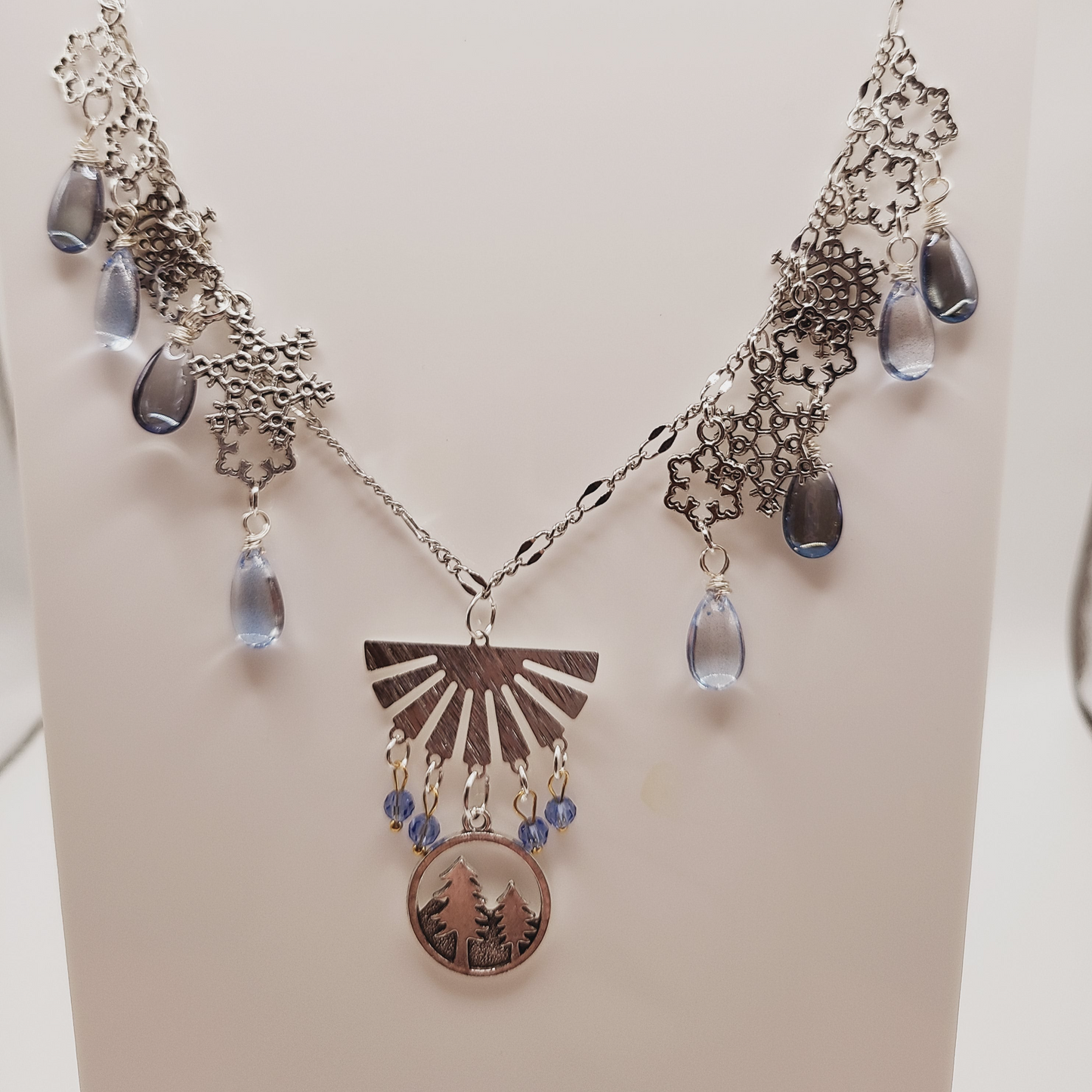 Snowy Forest with Blue Glass Gems